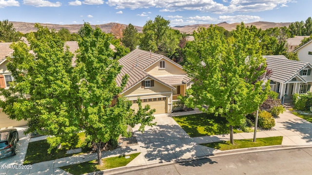 7449 Ambush Cir, Sparks, NV 89436 - view from above of property with mountains