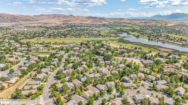 7449 Ambush Cir, Sparks, NV 89436 - aerial view of residential area with a water and mountain view and a local golf course