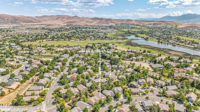 7449 Ambush Cir, Sparks, NV 89436 - aerial perspective of suburban area featuring a water and mountain view and a golf club