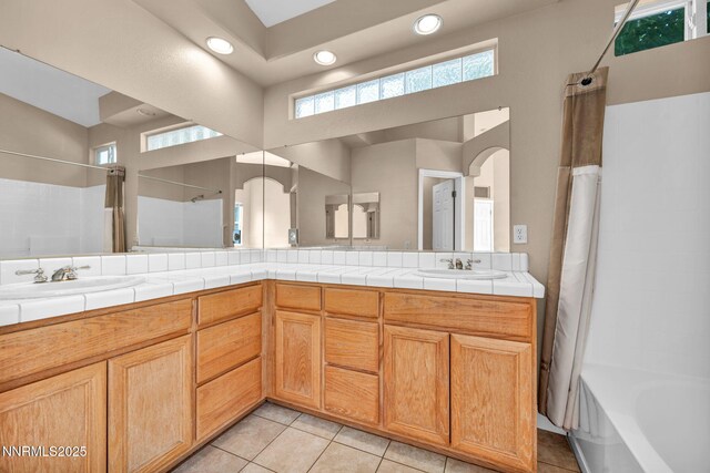 7449 Ambush Cir, Sparks, NV 89436 - bathroom featuring recessed lighting, double vanity, shower / bathtub combination with curtain, and tile patterned flooring
