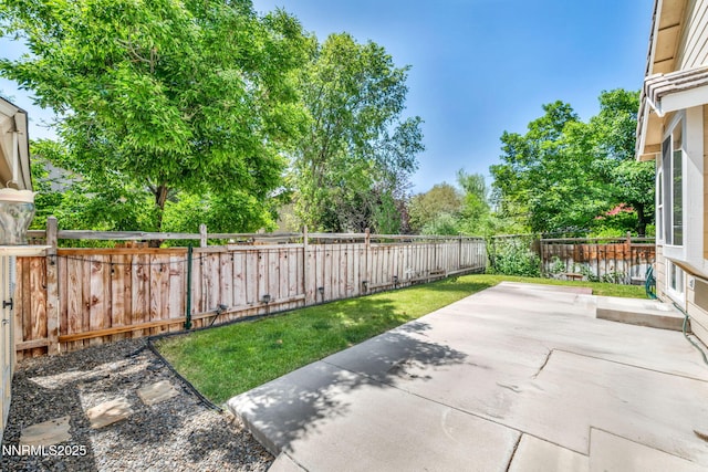7449 Ambush Cir, Sparks, NV 89436 - fenced backyard with a patio