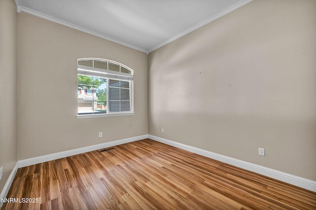 7449 Ambush Cir, Sparks, NV 89436 - empty room with wood finished floors and ornamental molding