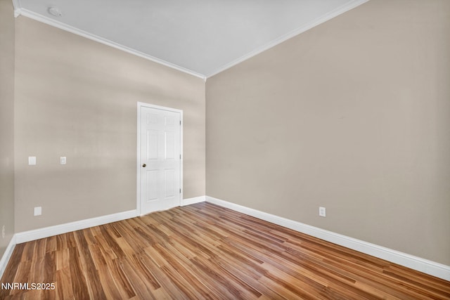 7449 Ambush Cir, Sparks, NV 89436 - spare room with crown molding, wood finished floors, and a smoke detector