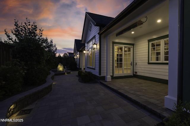 6145 Triple Crown Dr, Reno, NV 89511 - patio terrace at dusk with a patio and a fire pit