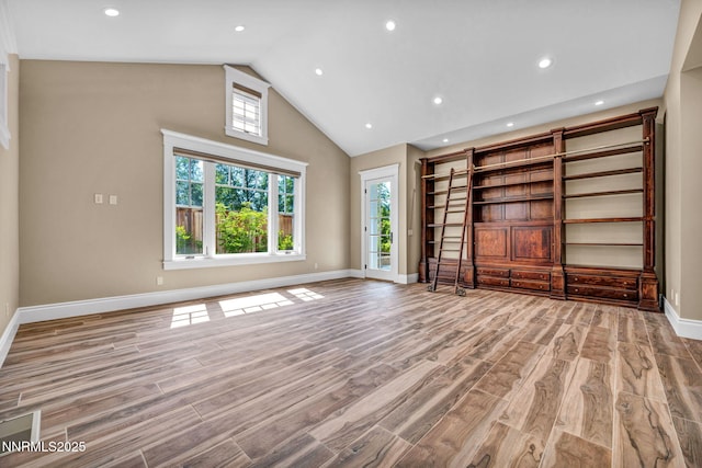 6145 Triple Crown Dr, Reno, NV 89511 - unfurnished living room featuring light wood-type flooring, recessed lighting, and high vaulted ceiling