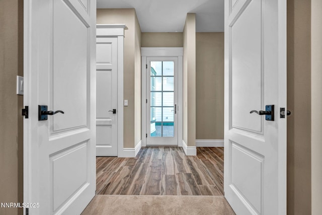 6145 Triple Crown Dr, Reno, NV 89511 - entrance foyer featuring baseboards and wood finished floors