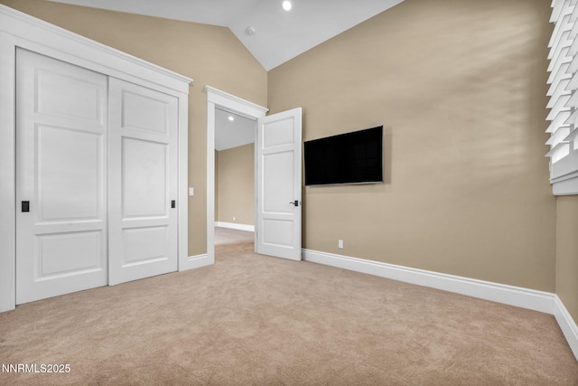 6145 Triple Crown Dr, Reno, NV 89511 - unfurnished bedroom with vaulted ceiling, light colored carpet, and a closet