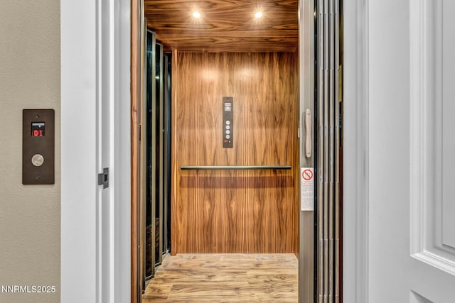 6145 Triple Crown Dr, Reno, NV 89511 - elevator featuring recessed lighting and wood finished floors
