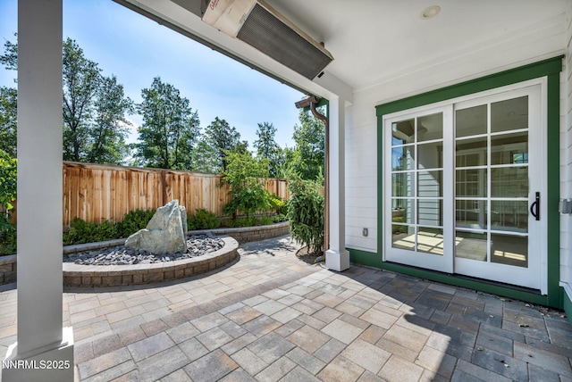 6145 Triple Crown Dr, Reno, NV 89511 - fenced backyard featuring a patio area