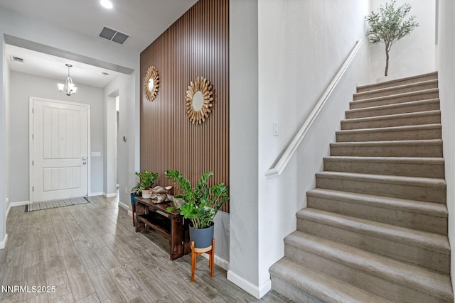 9435 Stony Hill Rd, Reno, NV 89521 - staircase with wood finished floors and a chandelier