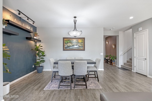 9435 Stony Hill Rd, Reno, NV 89521 - dining room with track lighting, wood finished floors, stairs, and recessed lighting