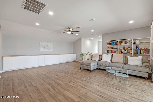 9435 Stony Hill Rd, Reno, NV 89521 - living room with wood finished floors, ceiling fan, and recessed lighting