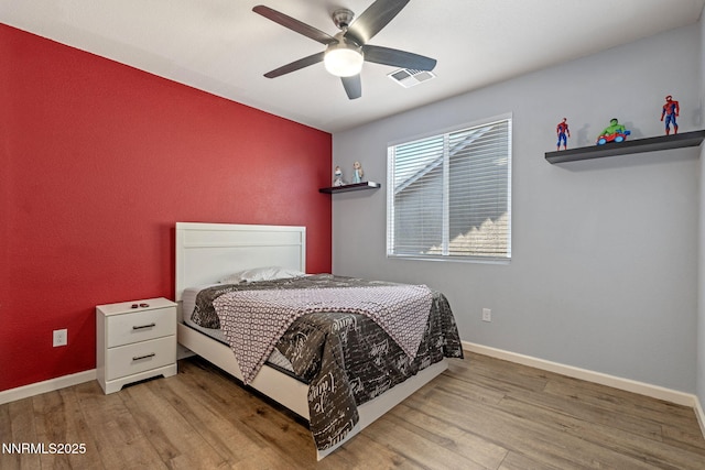 9435 Stony Hill Rd, Reno, NV 89521 - bedroom featuring wood finished floors and a ceiling fan