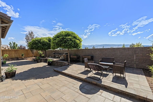 9435 Stony Hill Rd, Reno, NV 89521 - fenced backyard featuring a patio