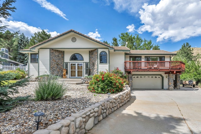 3279 Upland Ct, Carson City, NV 89703 - ranch-style home with stone siding, driveway, and a garage