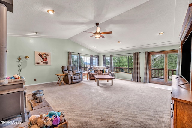 3279 Upland Ct, Carson City, NV 89703 - living area with ceiling fan, carpet flooring, lofted ceiling, and a textured ceiling
