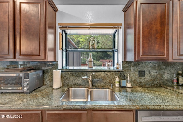3279 Upland Ct, Carson City, NV 89703 - kitchen with dishwasher, backsplash, and stone countertops