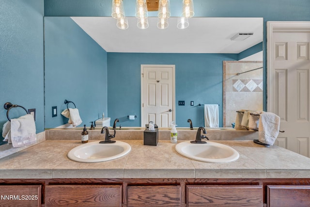 3279 Upland Ct, Carson City, NV 89703 - bathroom with double vanity and tiled shower