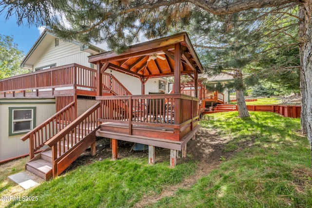 3279 Upland Ct, Carson City, NV 89703 - wooden deck with a gazebo, stairway, and a lawn