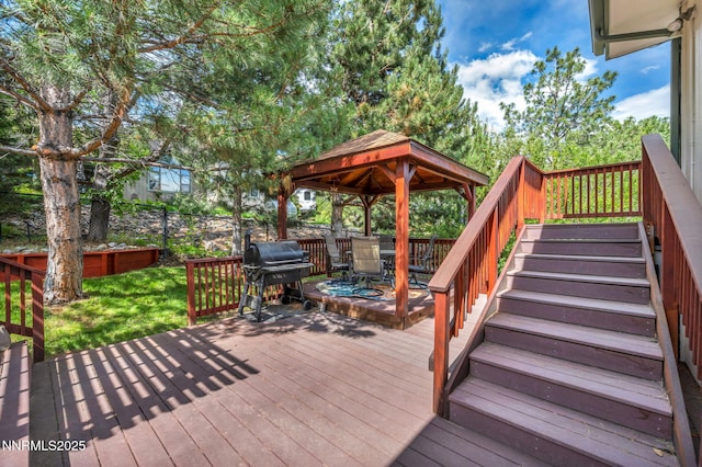 3279 Upland Ct, Carson City, NV 89703 - wooden terrace featuring a grill, a gazebo, and stairs