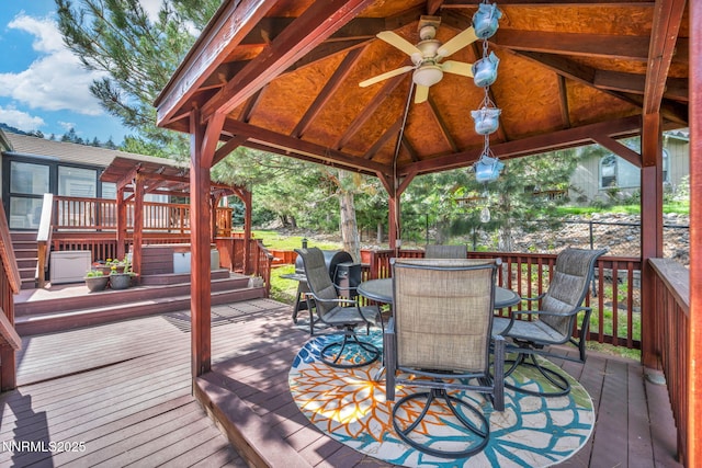 3279 Upland Ct, Carson City, NV 89703 - deck featuring ceiling fan, a gazebo, and outdoor dining area