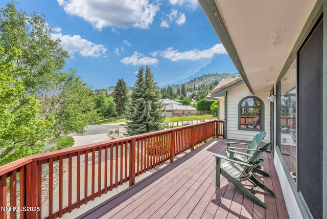3279 Upland Ct, Carson City, NV 89703 - wooden deck with a mountain view