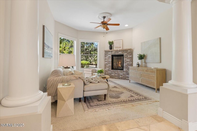 4990 Mountainshyre Rd, Reno, NV 89519 - living area with decorative columns, a ceiling fan, a fireplace, and recessed lighting