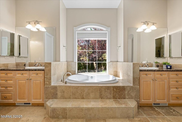 4990 Mountainshyre Rd, Reno, NV 89519 - bathroom featuring two vanities, a garden tub, and a high ceiling