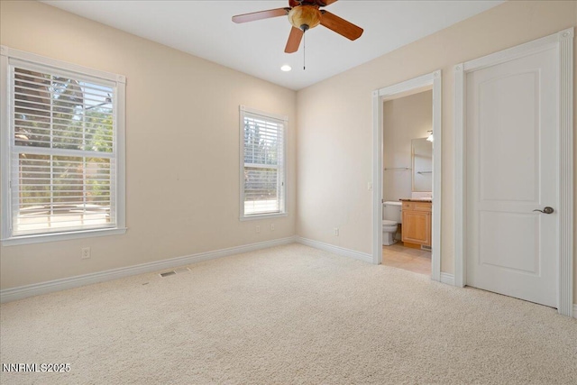 4990 Mountainshyre Rd, Reno, NV 89519 - unfurnished bedroom featuring light colored carpet, connected bathroom, and recessed lighting