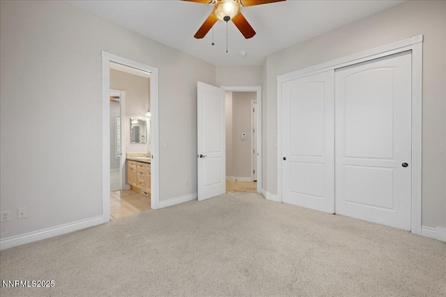 4990 Mountainshyre Rd, Reno, NV 89519 - unfurnished bedroom with light carpet, a closet, connected bathroom, and ceiling fan