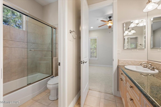 4990 Mountainshyre Rd, Reno, NV 89519 - bathroom featuring vanity, tile patterned floors, shower / bath combination with glass door, and ceiling fan