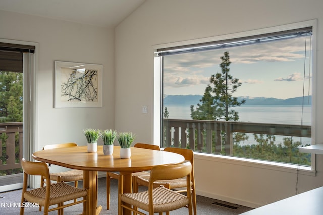 1459 Glarus Ct, Incline Village, NV 89451 - carpeted dining room featuring vaulted ceiling and a mountain view