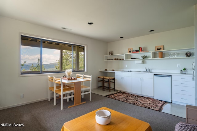 1459 Glarus Ct, Incline Village, NV 89451 - living area featuring dark carpet and baseboards