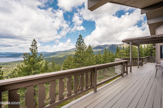 1459 Glarus Ct, Incline Village, NV 89451 - deck featuring a water and mountain view and a pergola
