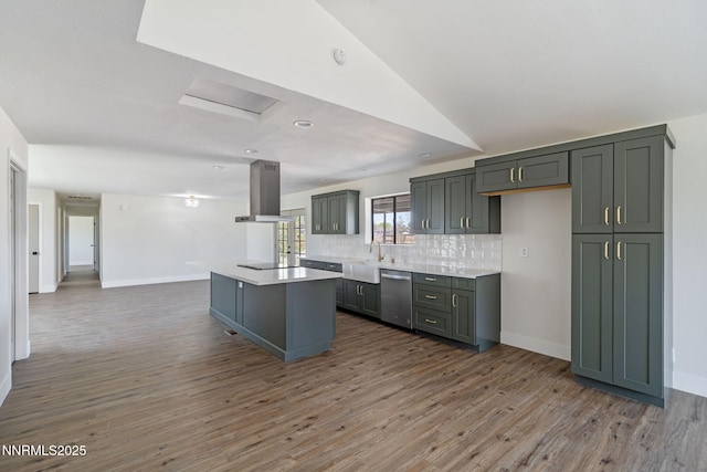 684 Carson River Dr, Fallon, NV 89406 - kitchen featuring island range hood, dishwasher, light countertops, wood finished floors, and decorative backsplash