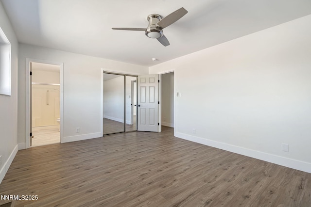 684 Carson River Dr, Fallon, NV 89406 - unfurnished bedroom with wood finished floors, a closet, connected bathroom, and ceiling fan