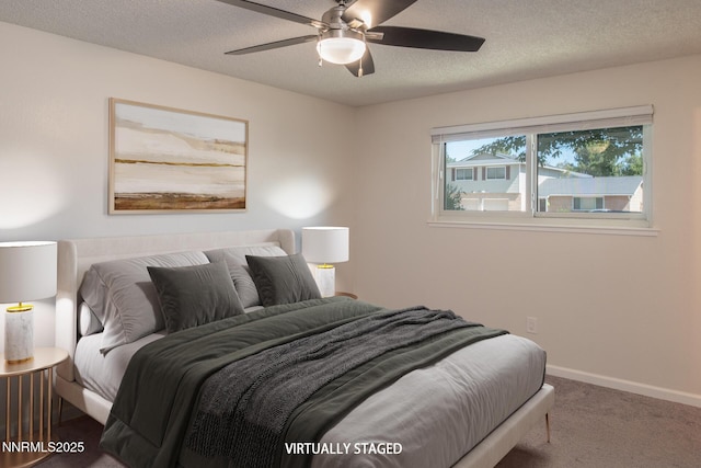 875 Camino Real Dr, Sparks, NV 89434 - carpeted bedroom with a textured ceiling and a ceiling fan