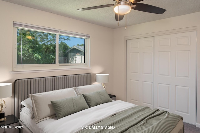 875 Camino Real Dr, Sparks, NV 89434 - carpeted bedroom with a closet, a textured ceiling, ceiling fan, and radiator heating unit