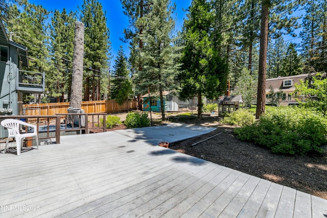 299 Chimney Rock Rd, Stateline, NV 89449 - wooden terrace featuring a fenced backyard and a shed