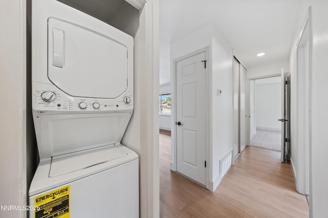 1305 Gault Way, Sparks, NV 89431 - laundry room with stacked washer / drying machine, light wood-style floors, and recessed lighting