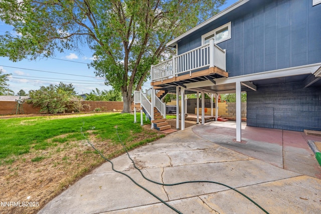 1305 Gault Way, Sparks, NV 89431 - fenced backyard with a deck, a patio area, and stairs