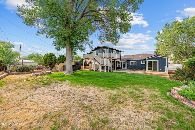 1305 Gault Way, Sparks, NV 89431 - back of property featuring a deck, stairway, a fenced backyard, and a patio area