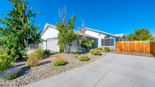 2015 Flycatcher Dr, Spanish Springs, NV 89441 - ranch-style house with an attached garage and stone siding