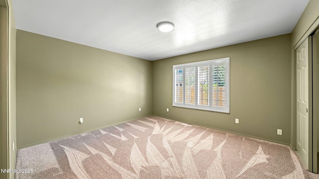 2015 Flycatcher Dr, Spanish Springs, NV 89441 - carpeted spare room featuring baseboards
