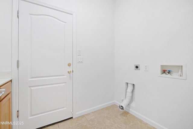169 Oakridge Dr, Dayton, NV 89403 - laundry area with hookup for an electric dryer, hookup for a washing machine, and light tile patterned floors