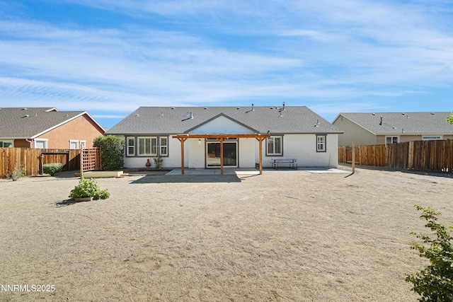 169 Oakridge Dr, Dayton, NV 89403 - back of house with a patio and a fenced backyard