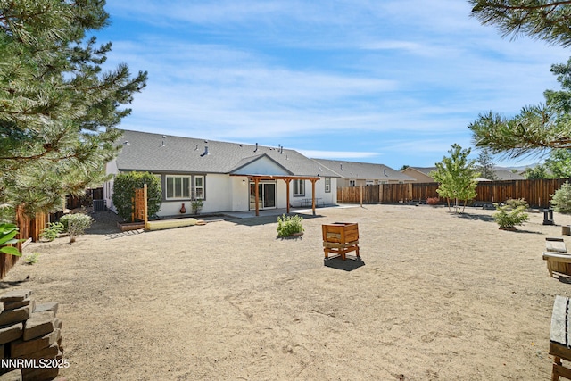 169 Oakridge Dr, Dayton, NV 89403 - back of house with a fenced backyard and a patio area