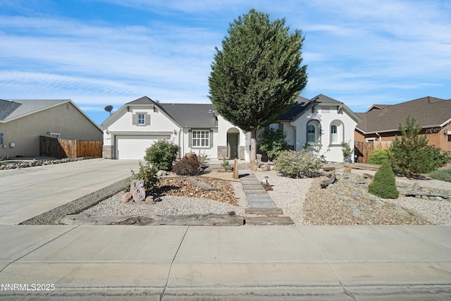 169 Oakridge Dr, Dayton, NV 89403 - view of front of home with concrete driveway, stucco siding, and a garage