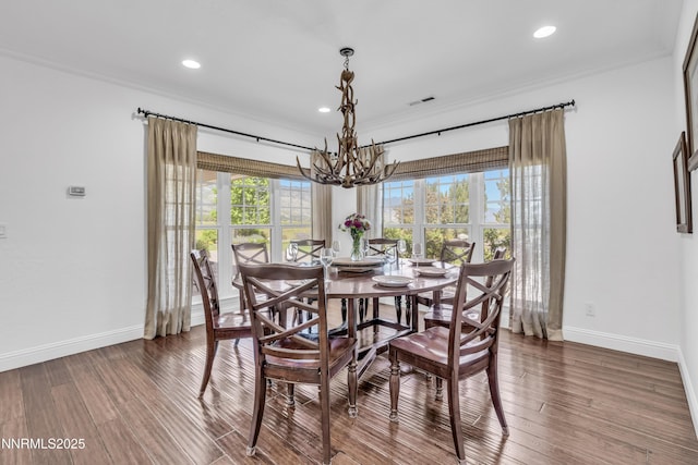 600 Artemesia Ln, Gardnerville, NV 89460 - dining space with a chandelier, recessed lighting, wood finished floors, and ornamental molding