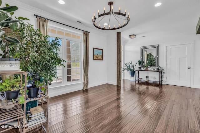 600 Artemesia Ln, Gardnerville, NV 89460 - entryway with a chandelier, wood finished floors, ornamental molding, and recessed lighting